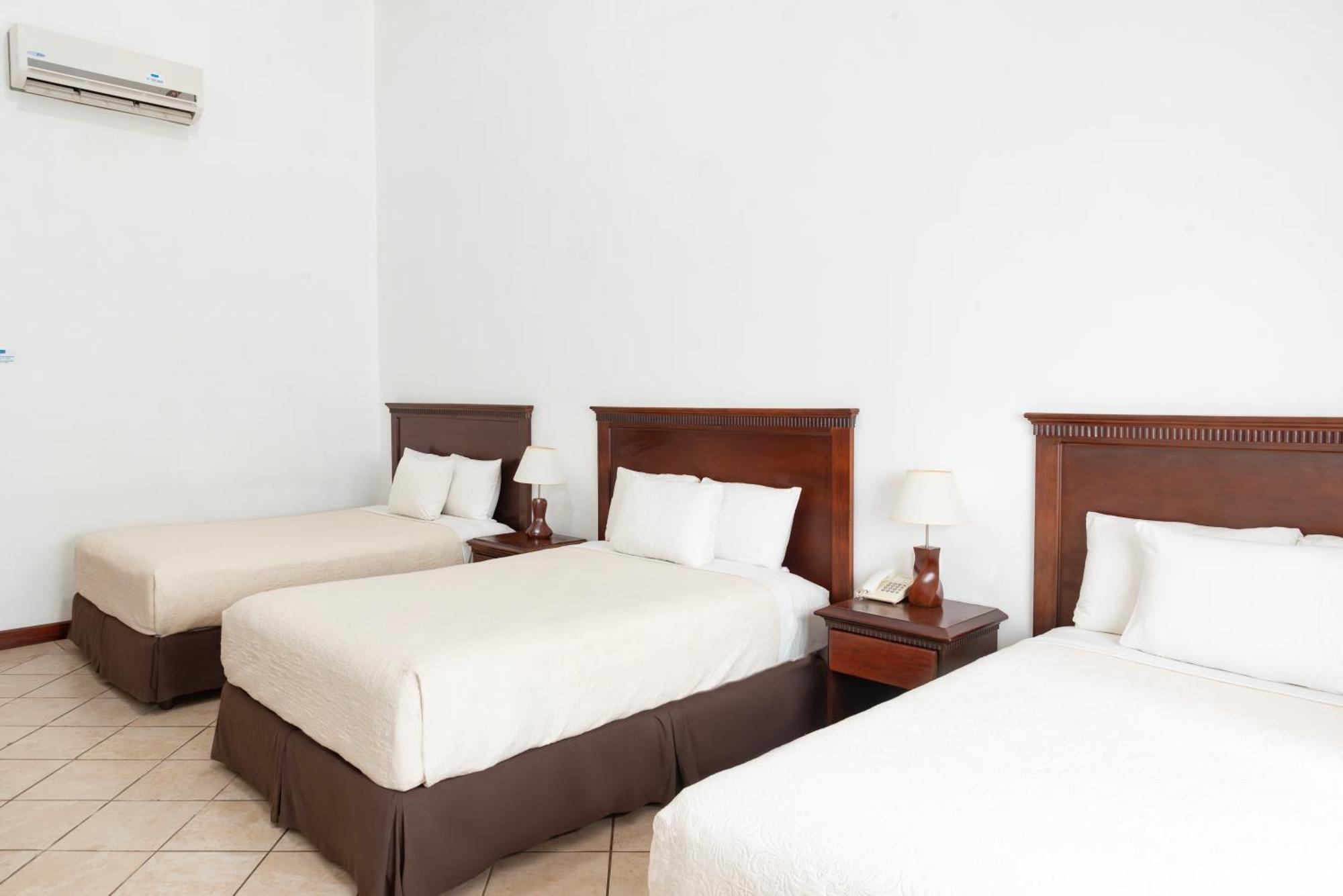 Hotel Cayman Suites مونتيريكو المظهر الخارجي الصورة